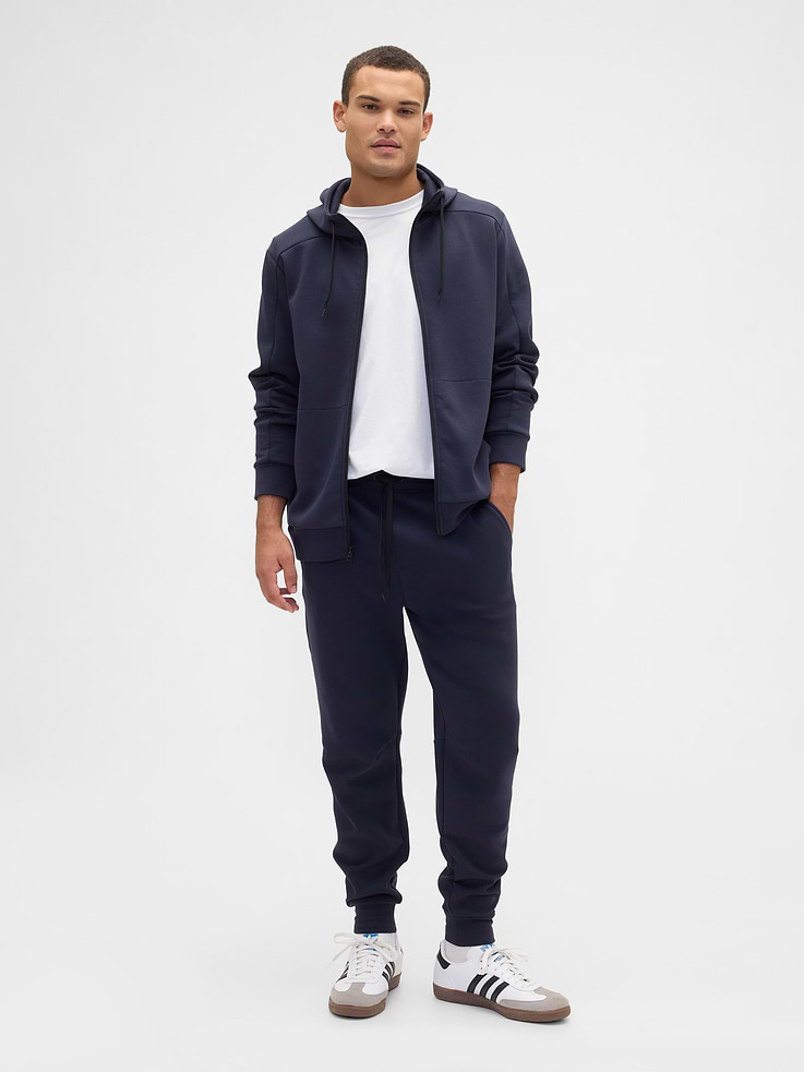 Image 1 of 4, Breathable fleece knit with stretch., Drawcord ties at elasticized waist (select styles may or may not have hardware around ties)., Front slant pockets., Seam details at knees., Banded cuffs., This product was made in a factory that invests in gender equity and women’s empowerment through RISE. Learn more at, Product #626190