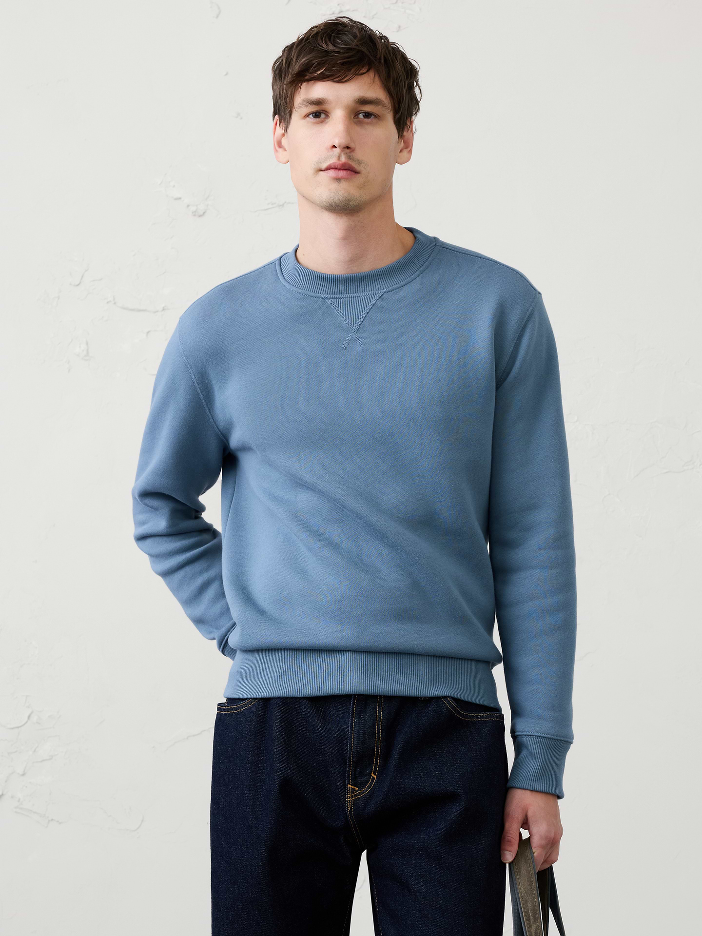 Image 1 of 7, Crafted from soft fleece that’s specially brushed for exceptional softness, this sweatshirt delivers a cozy feel inside and out., Crew neck. Long sleeves., Ribbed neck, arm cuffs and hem., Made exclusively for Banana Republic Factory., Product #1181069