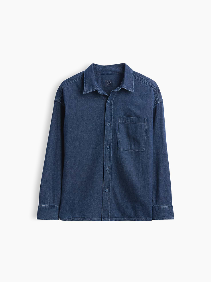 Image 1 of 3, Soft cotton denim button-up shirt. In a relaxed fit., Spread collar, button front., Long sleeves with drop shoulders and button cuffs., Back yoke seam., Chest patch pocket., Straight hem., Product #911805