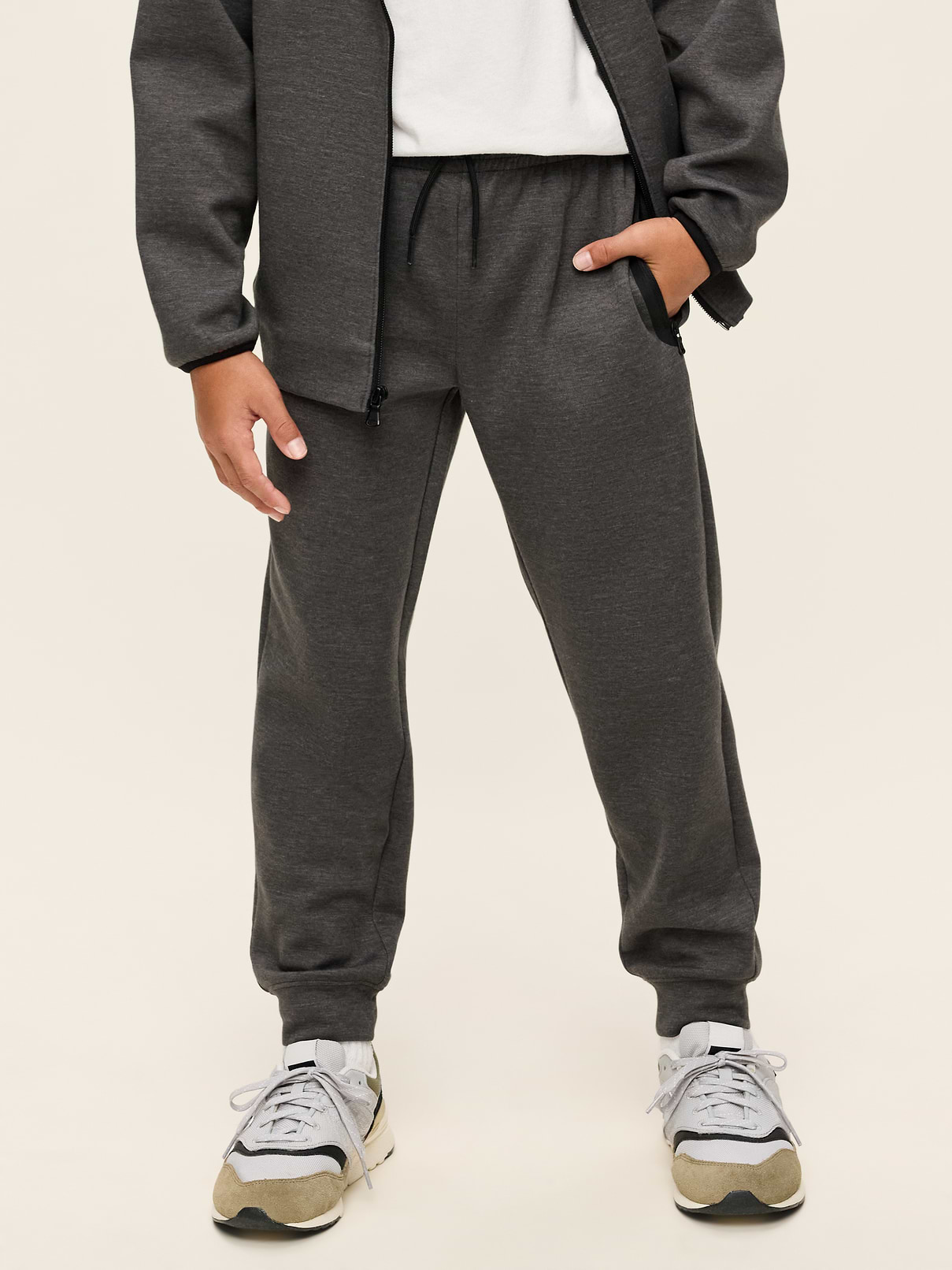 Image 1 of 3, Keep ’em moving in Old Navy Sport's Dynamic Fleece: A soft, breathable cotton blend that's made to move., elasticized waistband, interior drawstring, vertical zippered pockets at each hip, banded cuffs, Product #907677