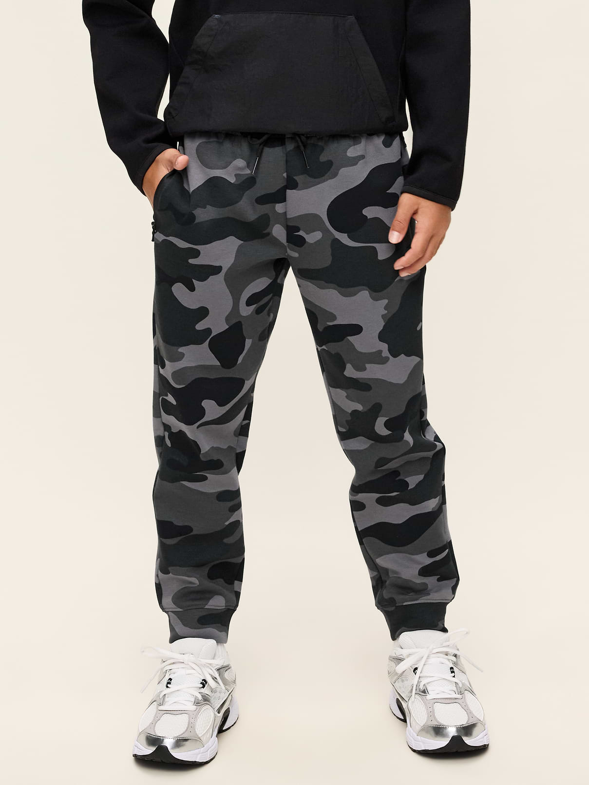 Image 1 of 3, Keep ’em moving in Old Navy Sport's Dynamic Fleece: A soft, breathable cotton blend that's made to move., elasticized waistband, interior drawstring, vertical zippered pockets at each hip, banded cuffs, Product #907679