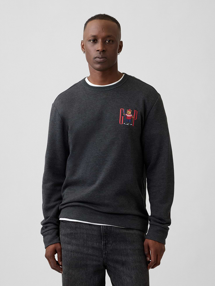 Image 1 of 4, Soft, comfy fleece., Long sleeves with banded cuffs., Crewneck., Gap logo at front., Banded hem., Product #523890