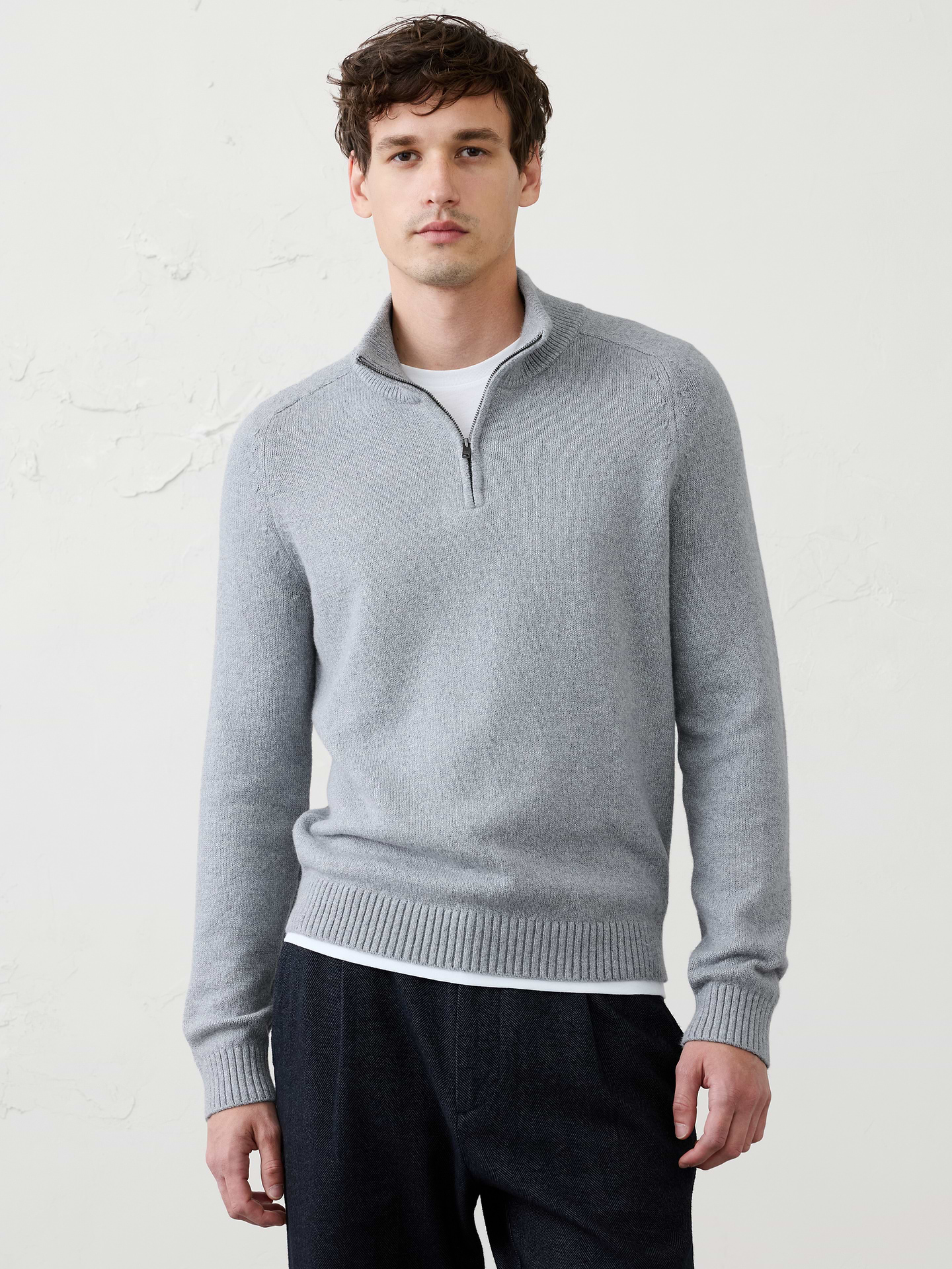 Image 1 of 3, Crafted from our ultra‑soft, plush cozy yarn, this sweater delivers warmth and comfort for the colder months. The classic quarter‑zip silhouette can be worn fully zipped into a mock neck or folded down for a more relaxed look., Mock collar. Saddle sleeves offer structured shoulders, enhanced comfort, and a tailored fit., Quarter zip placket., Ribbed collar, arm cuffs and hem., Made exclusively for Banana Republic Factory., Product #1175517