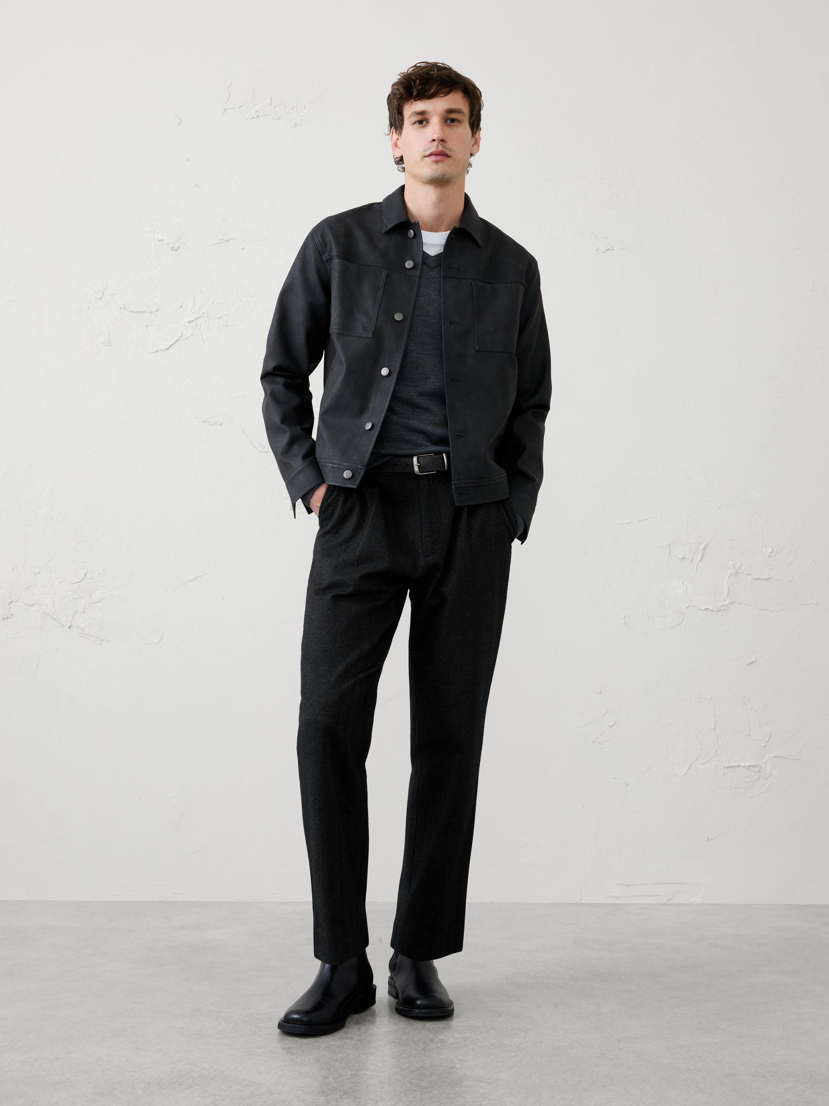 Image 1 of 6, A classic herringbone weave meets a modern wide‑leg silhouette in this refined trouser. Finished with front pleats for added polish, it balances timeless tailoring with contemporary style, making it an effortless choice for both special occasions and everyday wear., Button closure with zip fly. Belt loops., Front pleat detailing., Off-seam front pockets., Button through welt back pockets., Made exclusively for Banana Republic Factory., Product #1179690