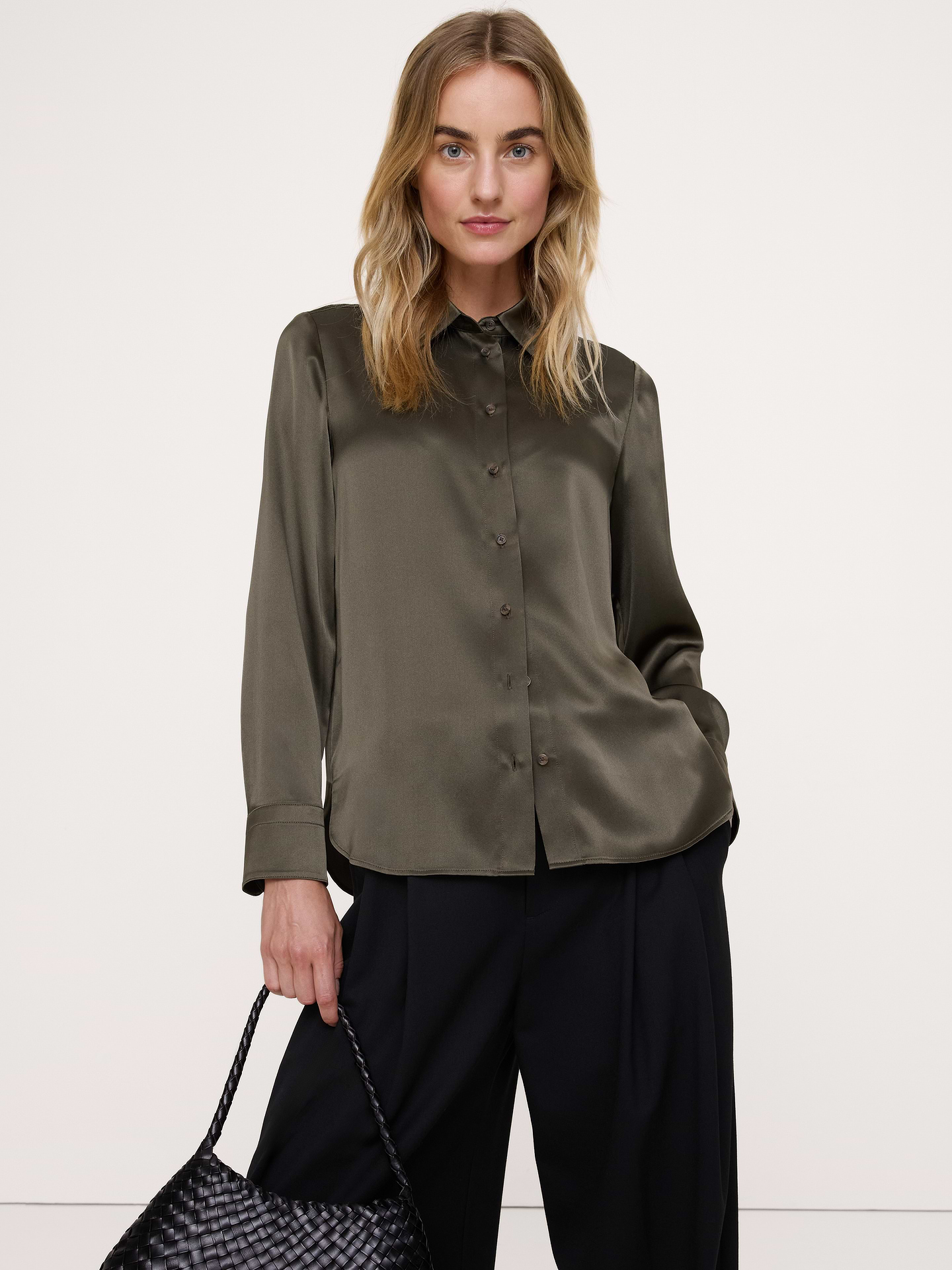 Image 1 of 8, Our Design team's favorite shirt. We perfected the fit of this shirt so it's relaxed, but never sloppy. This one's done up in our signature silk charmeuse—a soft fabric we love for its ability to make every occasion feel a little luxurious., Everyday Fit: Fitted shoulders, relaxed through the chest and waist., Point collar. Troca shell button front., Curved hem., Product #709208