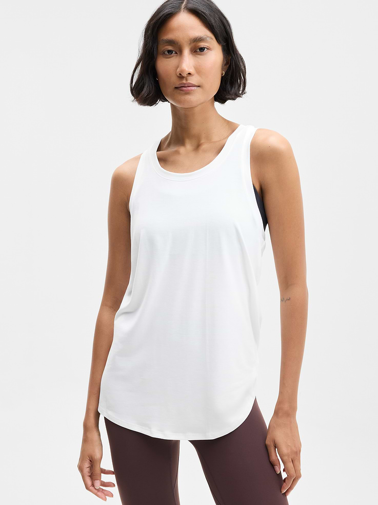 Image 1 of 6, FOR: Yoga or studio practice, FEEL: Soft, premium-weight comfort with luxurious TENCEL™ fibers that drape beautifully, FAVE: Your favorite studio top, modernized for more ease. Same premium-weight fabric, now with added front coverage and a minimal, clean back seam., Product #784675