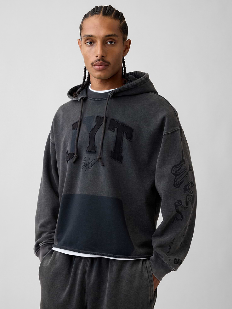 Image 1 of 9, Soft, heavyweight fleece hoodie. In an oversized fit., Hooded neckline with drawcords., Long sleeves with dropped shoulders and banded cuffs., Kanga pocket., JYT arch logo and graphics., Raw hem., Made with 14% recycled polyester. Compared to virgin materials, using recycled materials helps reduce resource use and waste., Product #1196142
