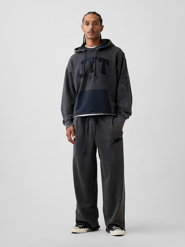 Image 1 of 8, Soft, heavyweight fleece sweatpants. In a baggy fit., Elasticized waist with drawcords., Slant pockets, back patch pocket., Raw hem., Embroidered JYT star at thigh., Made with 14% recycled polyester. Compared to virgin materials, using recycled materials helps reduce resource use and waste., Product #1196144