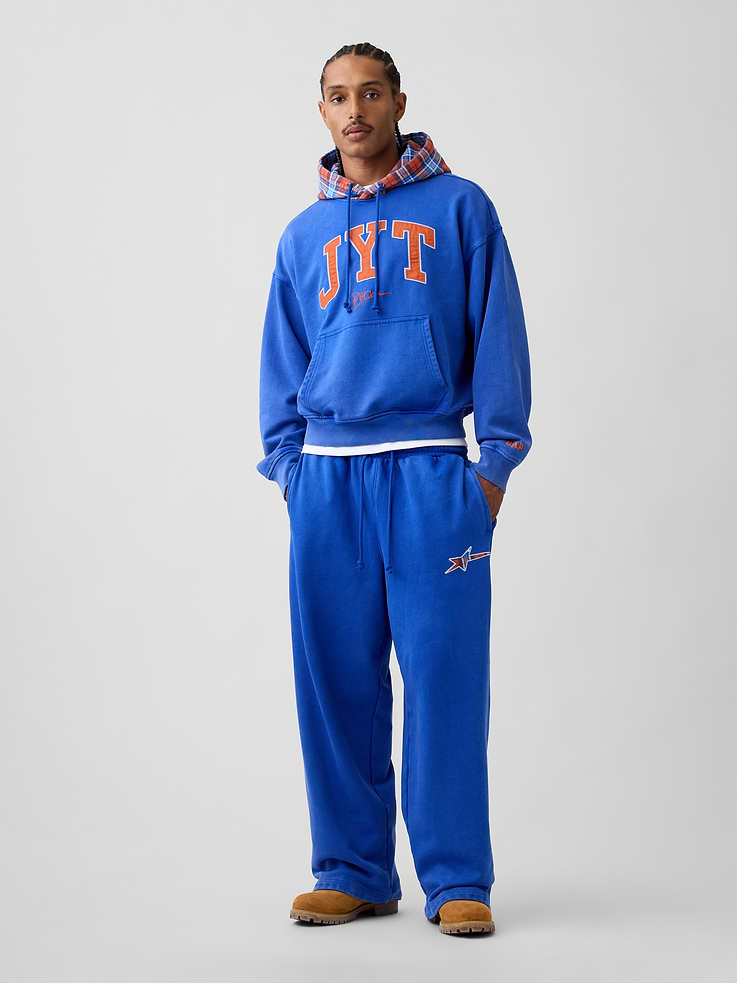 Image 1 of 9, Soft, heavyweight fleece sweatpants. In a baggy fit., Elasticized waist with drawcords., Slant pockets, back patch pocket., Embroidered star at thigh., Made with 14% recycled polyester. Compared to virgin materials, using recycled materials helps reduce resource use and waste., Product #1196148