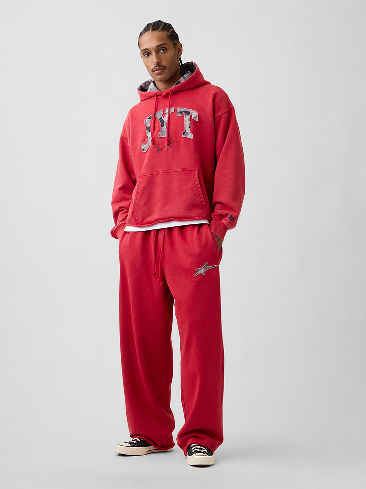 Image 1 of 8, Soft, heavyweight fleece sweatpants. In a baggy fit., Elasticized waist with drawcords., Slant pockets, back patch pocket., Embroidered star at thigh., Raw hem., Made with 14% recycled polyester. Compared to virgin materials, using recycled materials helps reduce resource use and waste., Product #1196145