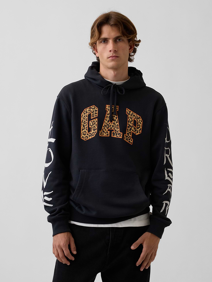 Image 1 of 8, In celebration of Gap Hoodie Day, we brought together emerging designers from all over the world. Reimagining our iconic logo hoodie. Making it new again., Soft, heavyweight cotton-blend fleece hoodie. In a relaxed fit., Hooded neckline with drawcords., Long sleeves., Kanga pocket., Banded hem and cuffs., Gap arch logo, redesigned by Come Tees., Product #1199914