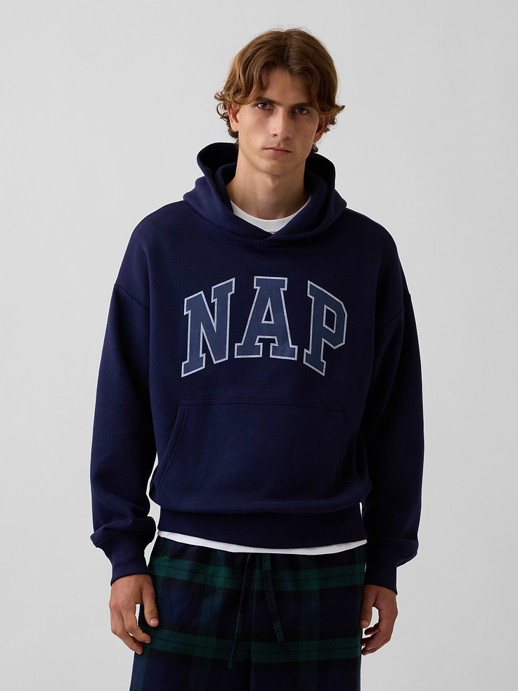 Image 1 of 5, Our softer than soft sweats. Brushed on the inside. Smooth on the outside. Made so that no two are alike., Soft cotton-blend fleece pullover hoodie. In an oversized fit., Hooded neckline.Long sleeves with drop shoulders., NAP arch logo at front., Kanga pocket., Banded cuffs & hem., Made with 23% recycled polyester. Compared to virgin materials, using recycled materials helps reduce resource use and waste., Explore our GapSweats Guide ., This product was made in a factory that invests in gender equity and women’s empowerment through RISE. Learn more at gapinc.com/equity ., Product #898155
