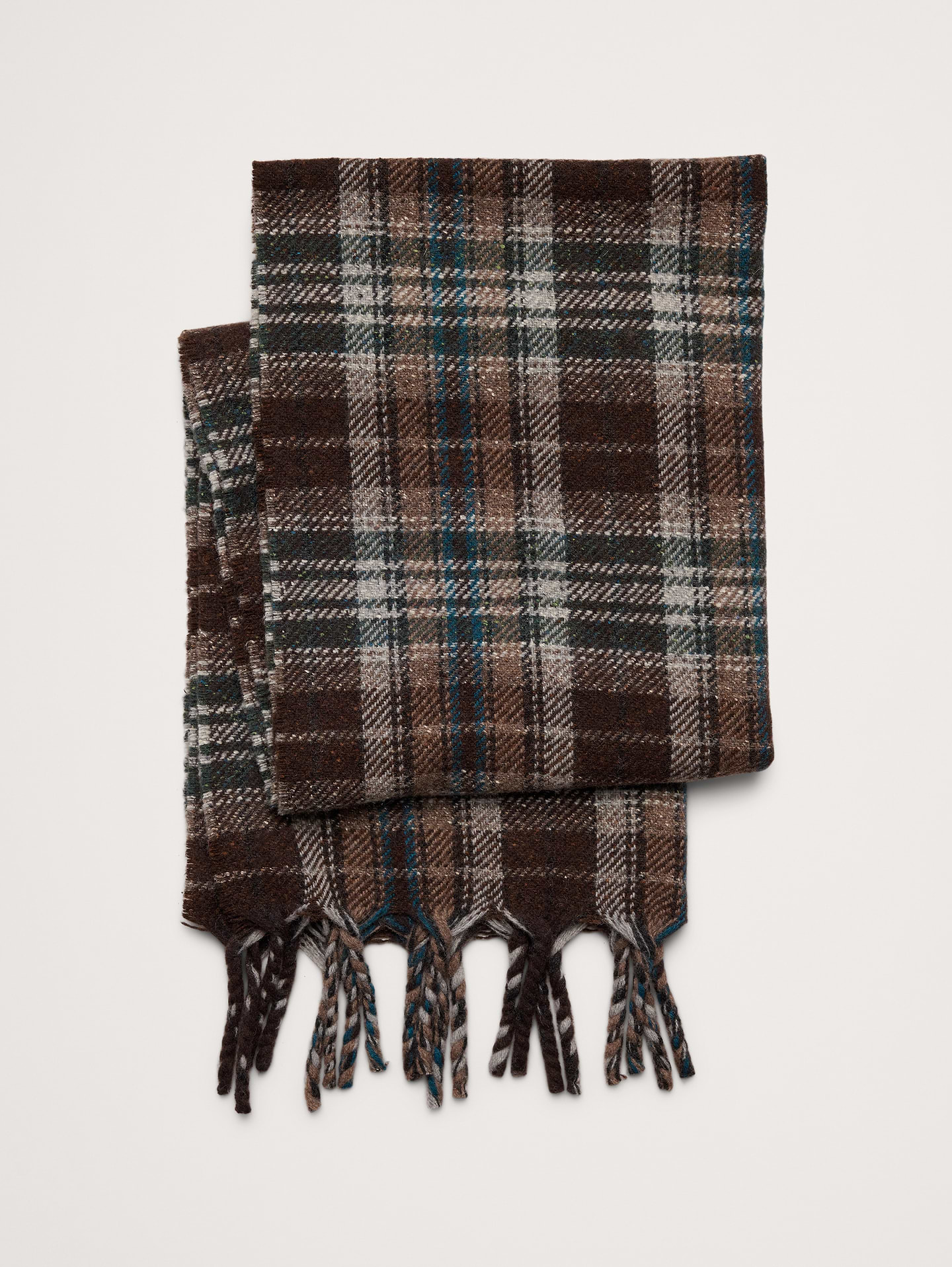 Image 1 of 3, Chosen for its lightweight warmth and sophisticated appeal, this timeless scarf is made from a wool-blend with a traditional glen plaid pattern., Product #906939