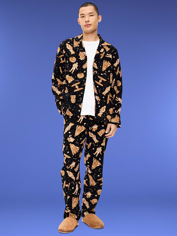 Image 1 of 5, notched collar, long sleeves, patch pocket, full button front, matching pajamas pants, drawstring waistband, on-seam pockets, licensed graphic, © & ™ Lucasfilm, Ltd, Product #908771