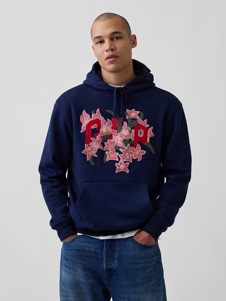 Image 1 of 7, In celebration of Gap Hoodie Day, we brought together emerging designers from all over the world. Reimagining our iconic logo hoodie. Making it new again., Soft, heavyweight cotton-blend fleece hoodie. In a relaxed fit., Hooded neckline with drawcords., Long sleeves., Kanga pocket., Banded hem and cuffs., Gap arch logo, redesigned by AO YES., Product #1199910