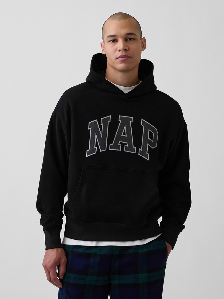 Image 1 of 5, Our softer than soft sweats. Brushed on the inside. Smooth on the outside. Made so that no two are alike., Soft cotton-blend fleece pullover hoodie. In an oversized fit., Hooded neckline.Long sleeves with drop shoulders., NAP arch logo at front., Kanga pocket., Banded cuffs & hem., Made with 23% recycled polyester. Compared to virgin materials, using recycled materials helps reduce resource use and waste., Explore our GapSweats Guide ., This product was made in a factory that invests in gender equity and women’s empowerment through RISE. Learn more at gapinc.com/equity ., Product #898155