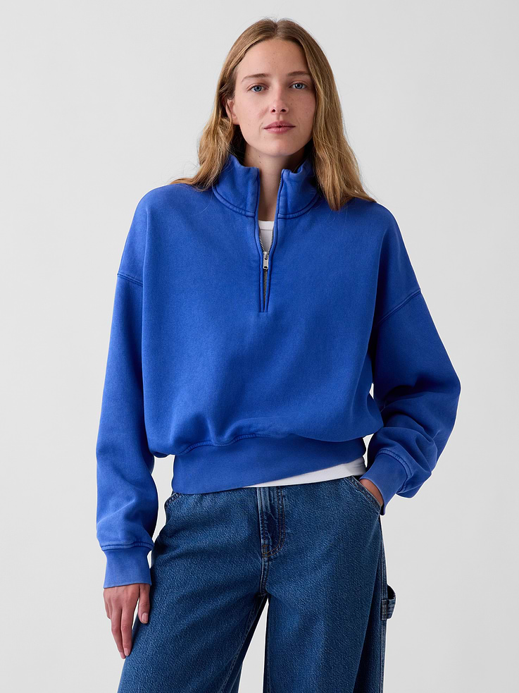 Image 1 of 6, Our softer than soft sweats. Brushed on the inside. Smooth on the outside. Made so that no two are alike., Soft cotton-blend fleece pullover sweatshirt. In an extra oversized and slightly cropped length., Mockneck with half-zip closure., Long sleeves with drop shoulders., Banded cuffs & hem., Made with 23% recycled polyester. Compared to virgin materials, using recycled materials helps reduce resource use and waste., Explore our GapSweats Guide ., Product #903061