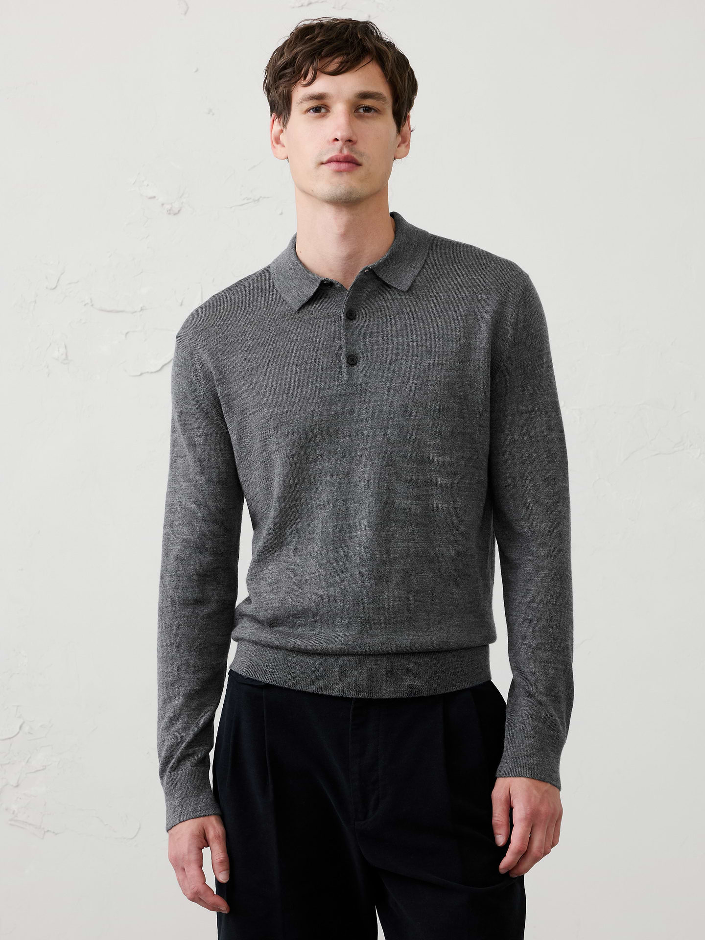 Image 1 of 6, Crafted from 100% merino wool, this long-sleeve polo delivers premium softness, natural warmth, and breathable comfort. A versatile staple that transitions easily from work to weekend, finished with rib-knit cuffs and hem for a refined look., WASHABLE MERINO WOOL: Skip the dry cleaners, this 100% Merino wool sweater is lightweight, comfortable, moisture wicking, odor resistant and machine washable., Polo collar with button placket. Long sleeves., Slight dropped shoulders., Ribbed collar, arm cuffs and hem., Straight hem., Made exclusively for Banana Republic Factory., Product #1175509