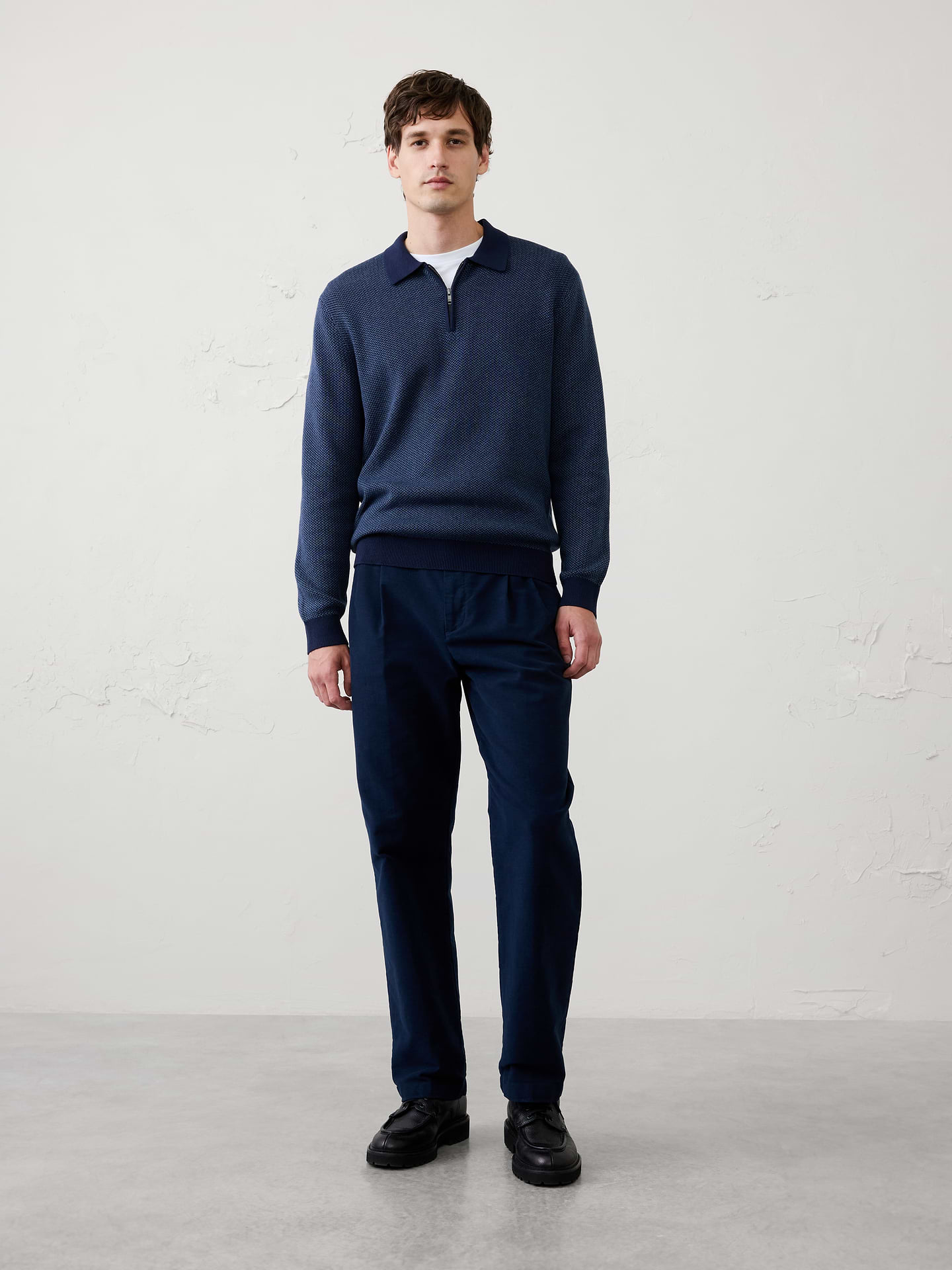 Image 1 of 4, A modern update to a timeless classic, this birdseye quarter-zip sweater polo combines refined texture with effortless versatility. Crafted in an allover birdseye knit, it offers subtle dimension and a polished appearance that's equally suited for workdays and weekends., Polo collar with zipper placket. Long sleeves., Ribbed arm cuffs and hem., Made exclusively for Banana Republic Factory., Product #1175813