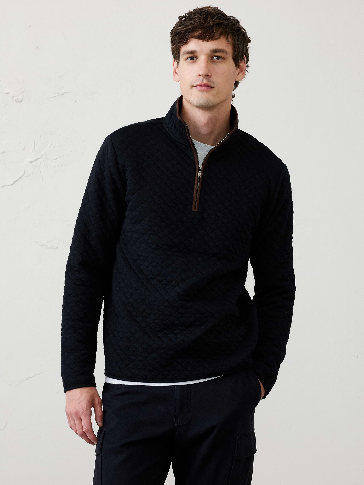 Image 1 of 3, Made from a soft diamond‑quilted fabric, this quarter‑zip delivers warmth with a refined, textured look. Easy to layer over tees and shirts, it offers versatile comfort and polished style for cooler days., Mock neck. Long sleeves., Quarter-zip neckline., Vegan suede contrast trim details., Diamond quilting throughout adds texture and lightweight insulation., Made exclusively for Banana Republic Factory., To view a copy of this product’s label, copy the style number below and search this database Law Label Lookup <, Product #1181066