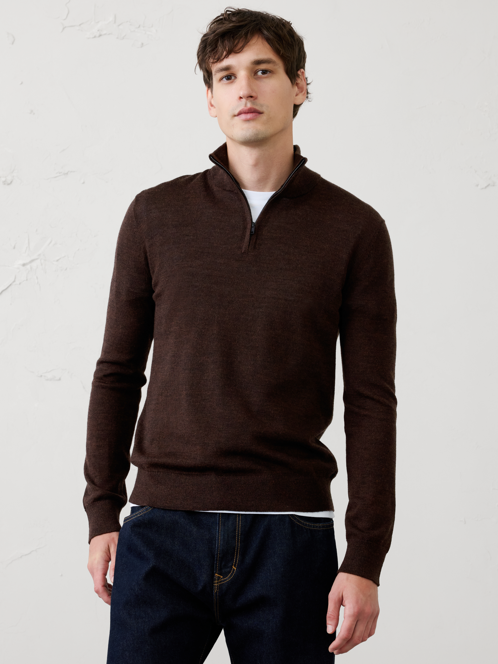 Image 1 of 6, Spun from 100% merino wool, this quarter-zip sweater combines natural temperature regulation with elevated style. The mock-neck silhouette lends a modern touch, while ribbed cuffs and hem provide a comfortable, structured fit., WASHABLE MERINO WOOL: Skip the dry cleaners, this 100% Merino wool sweater is lightweight, comfortable, moisture wicking, odor resistant and machine washable., Mock neck. Long sleeves., Slight dropped shoulders., Ribbed neck, arm cuffs and hem., Straight hem., Made exclusively for Banana Republic Factory., Product #1175513