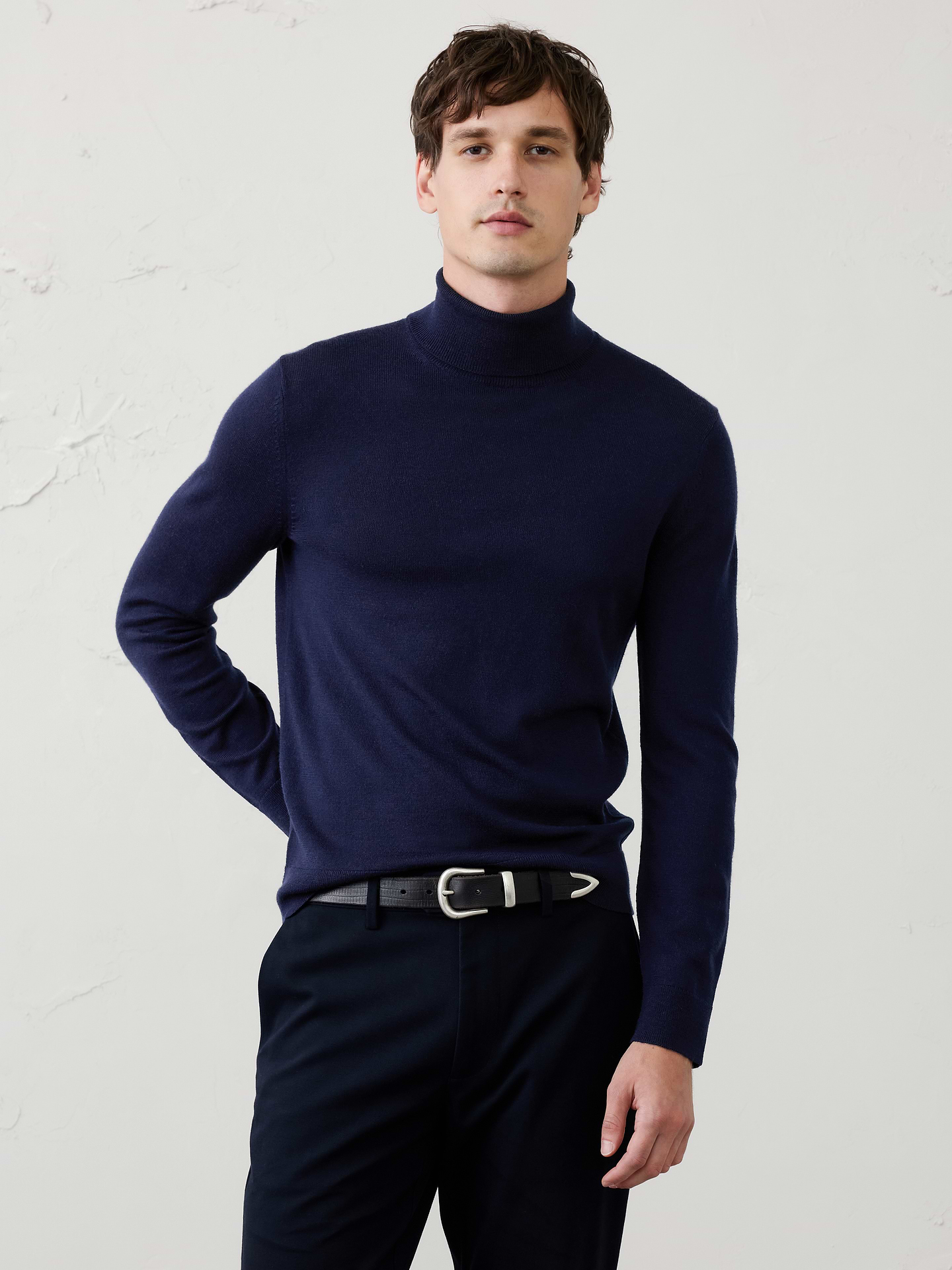 Image 1 of 3, Our classic Merino wool sweater is the definition of timeless versatility. Crafted from luxuriously soft Merino wool, it offers lightweight warmth, natural breathability, and a refined finish. Designed to be worn year‑round, it layers effortlessly and delivers polished style for any occasion., Turtleneck collar. Long sleeves., Ribbed neckline, arm cuffs and hem., Made exclusively for Banana Republic Factory., Product #1175819