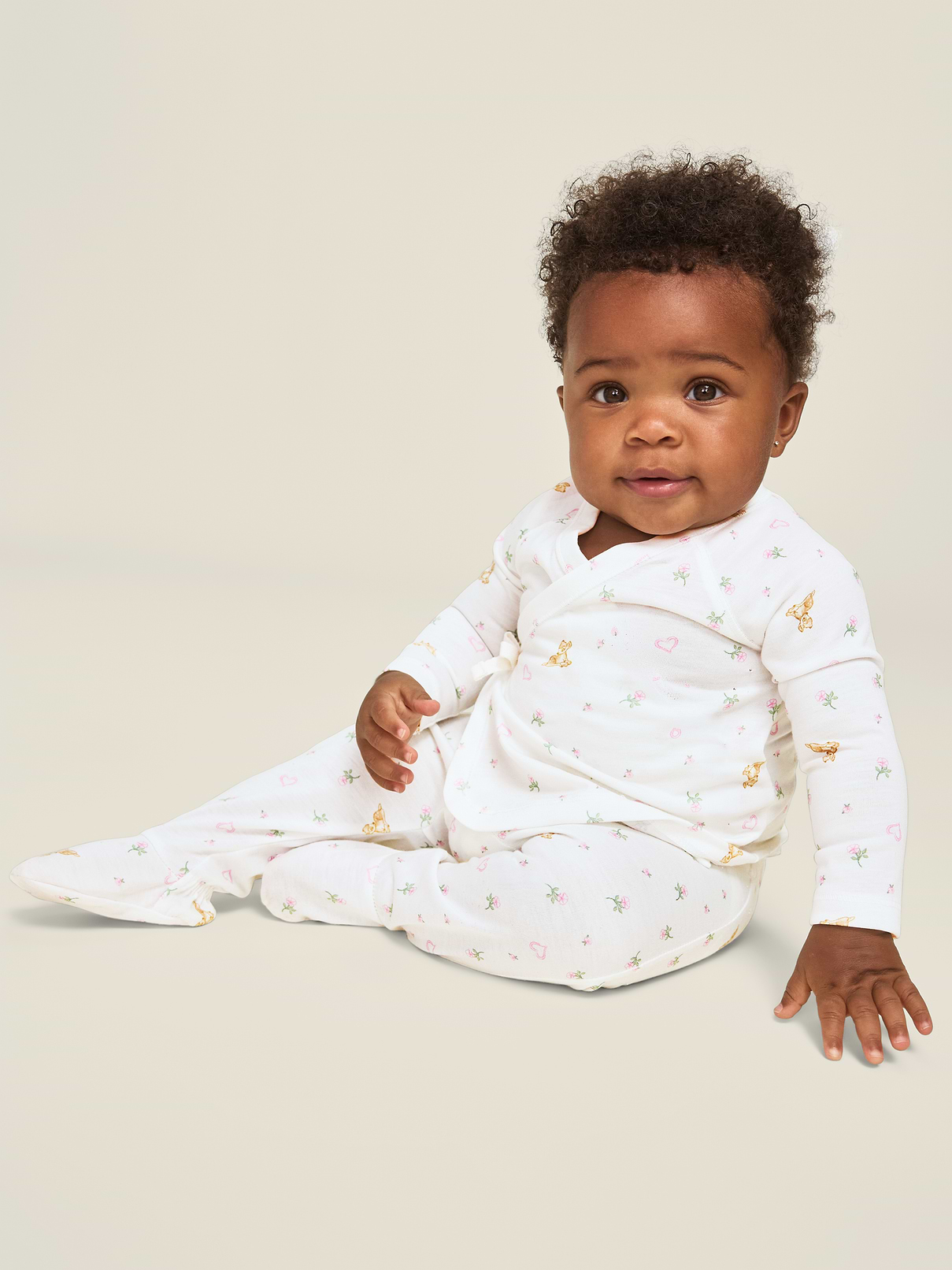 Image 1 of 5, v neck, wrap front style, matching bottoms, elasticized waistband, sewn-in feet, licensed graphic, ©Disney, Product #1184365