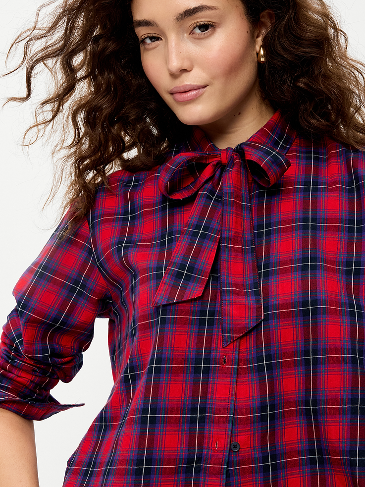 Image 1 of 8, spread collar, tie-neck detail, long sleeves, full-button front, button cuffs, Product #1184375