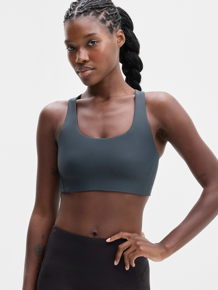 Image 1 of 4, BEST FOR CARDIO: run + train + HIIT, IMPACT: Medium-impact workouts, best for D-DD cups, FEEL: PowerMove fabric is sleek, weightless, and helps keep you cool with quick-drying properties, FAVE: Dual cross-back straps and shaping seams for a secure, sculpted fit, Removable pads hold their shape from wash to wear, Lined with PowerMesh for breathable, sweat-proof coverage, Product #864107