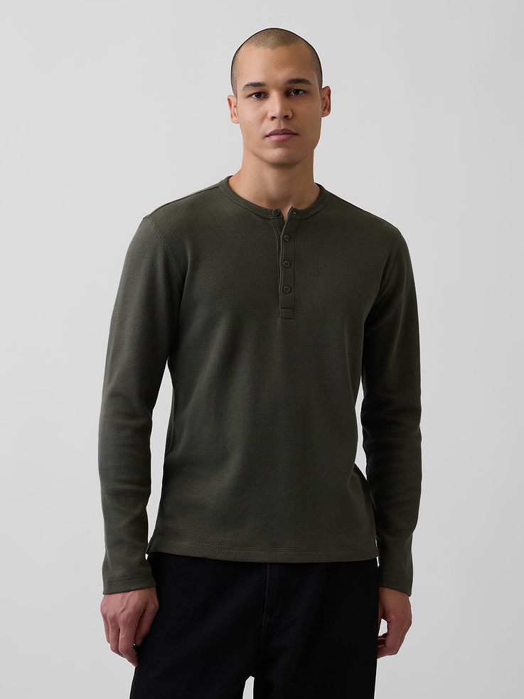 Image 1 of 5, Soft, waffle-knit stretch cotton Henley T-shirt., Crewneck with front button placket., Long sleeves., This product was made in a factory that invests in gender equity and women’s empowerment through RISE. Learn more at gapinc.com/equity ., Product #1185662