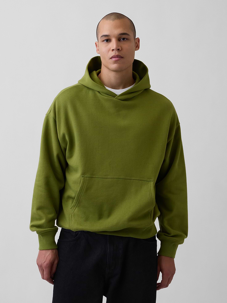 Image 1 of 5, Soft, heavyweight cotton-blend fleece pullover hoodie., Hooded neckline., Long sleeves with banded cuffs., Kanga pocket., Banded hem., This hoodie is made with 14% recycled polyester. Compared to virgin materials, using recycled materials helps to reduce resource use and waste., Explore our GapSweats Guide ., This product was made in a factory that invests in gender equity and women’s empowerment through RISE. Learn more at gapinc.com/equity ., Product #821270