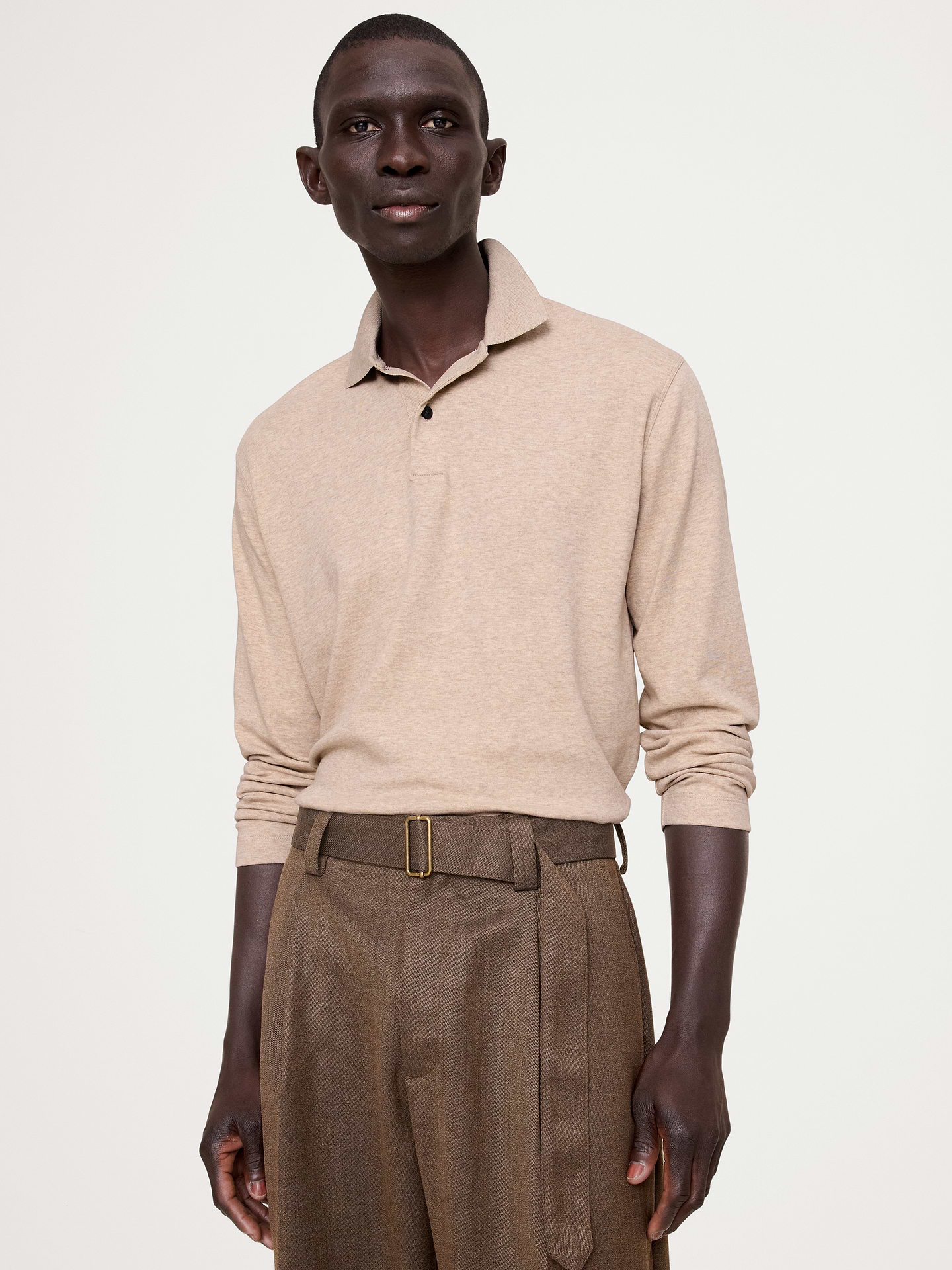 Image 1 of 1, This long-sleeve polo is cut from our Luxury-Touch cotton jersey—beloved for its signature softness and a smooth finish that leans more dressed-up in appearance., Standard Fit: A straight and easy fit., Polo collar with button placket., Straight hem with vented sides., Product #829415