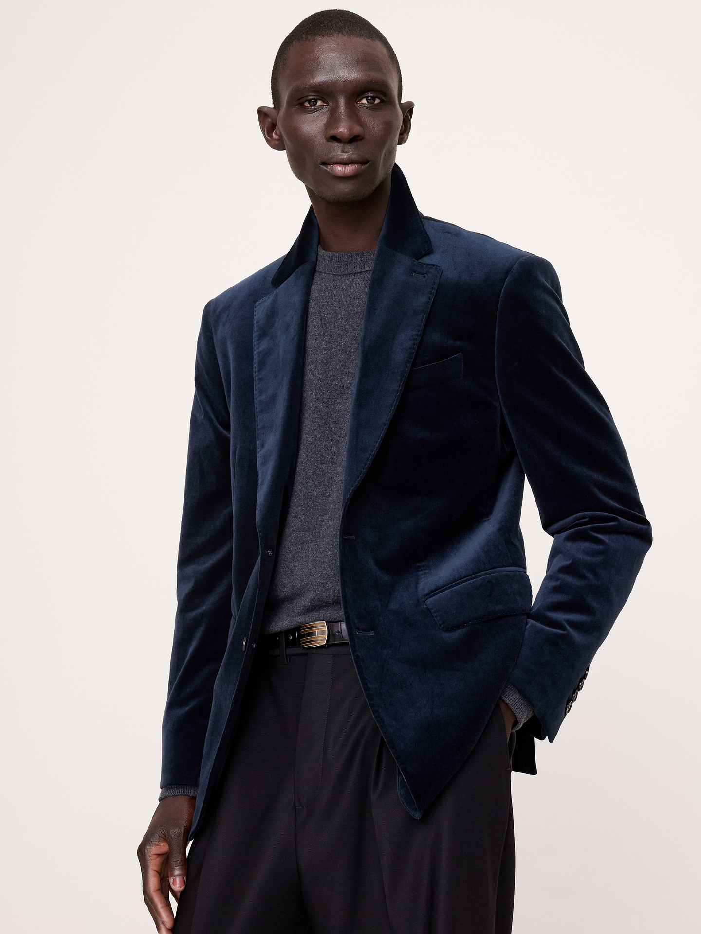 Image 1 of 8, We selected a soft cotton velvet for this statement blazer, opting to cut it plush-up to enhance its luster and add a more formal appearance., Tailored Slim Fit: Designed for ease of movement. Here, we opted for an English cut with a more structured shoulder construction., Notch lapel with 2-button front., Three exterior pockets, three interior pockets., Double back vent., Fully lined., Product #906641
