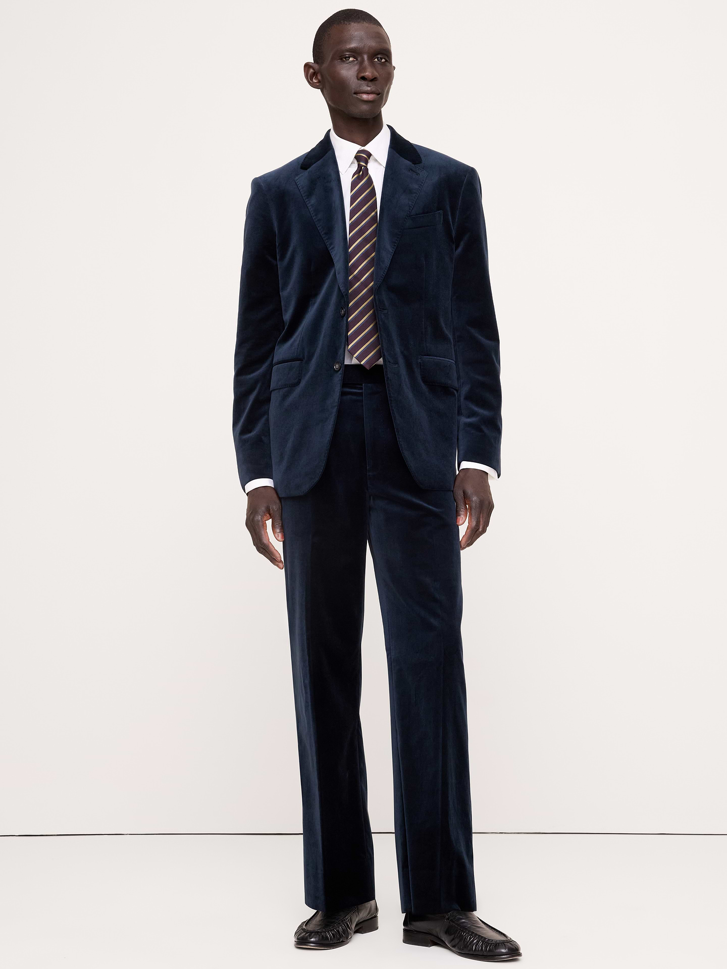 Image 1 of 7, When the occasion calls for something truly special, reach for this velvet pant. We selected a beautiful quality of cotton velvet for its construction, cutting the fabric plush-up to add to its luster., Straight Fit: Mid rise. Straight through hip and thigh., Zip fly with hook-and-bar. Belt loops and after-dinner split detail at back., Front and back pockets., Half lined., Product #909509