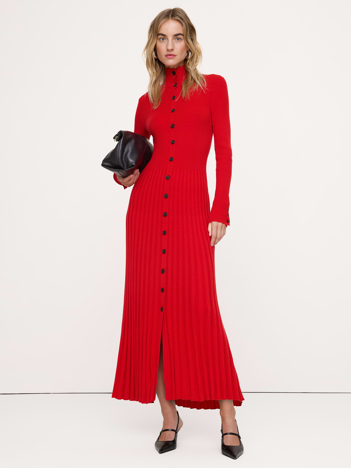 Image 1 of 8, This sleek long-sleeve sweater dress is made from figure-hugging ribbed-knit stitches, crafted in a wool blend, loved for its stretch and contouring effect. Finished with a gorgeous pleated skirt., Fitted: Fitted bust, waist, and hip with a flowy skirt., Mock neck with button-front closure., Unlined., Product #1180164
