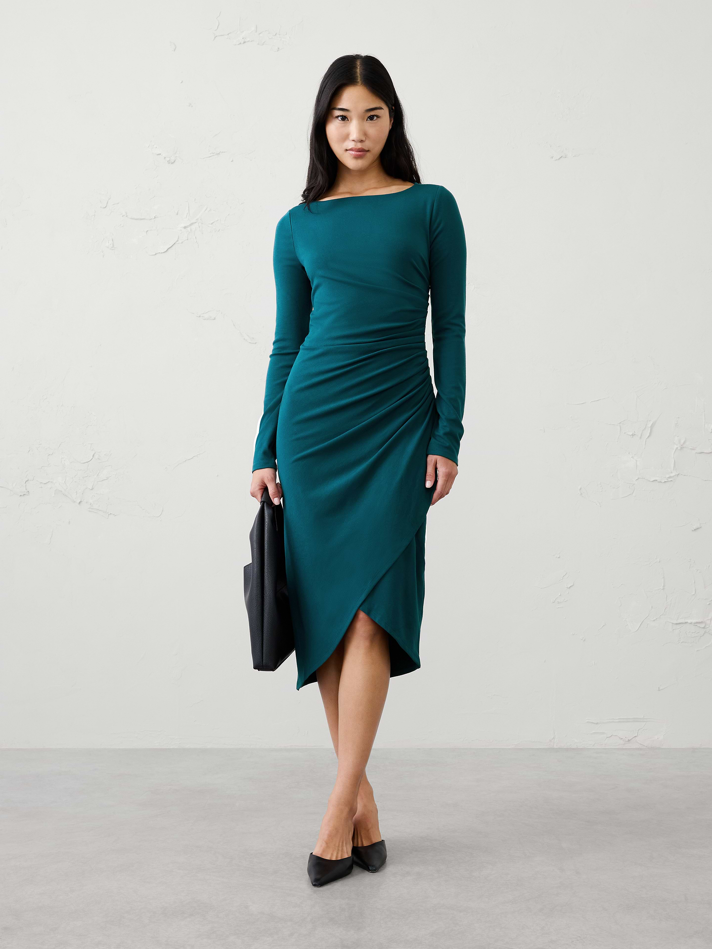 Image 1 of 7, Wide boat neckline. Long sleeves., Asymmetrical ruching radiates from the side seam., Fitted through the hips., Asymmetrical wrap‑style skirt., Overlapping front panel forms a subtle tulip hem effect., Made exclusively for Banana Republic Factory., Product #1178220
