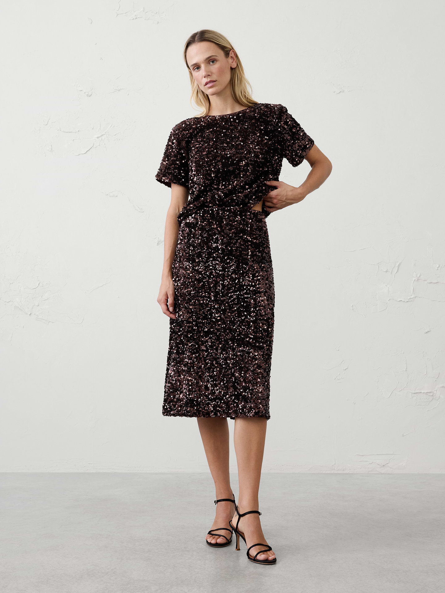 Image 1 of 3, A festive update to a customer favorite, our sequin midi slip skirt brings effortless glamour to holiday dressing., Pull on skirt., Body-skimming fit with elegant drape., Fully lined., Made exclusively for Banana Republic Factory., Product #1185775