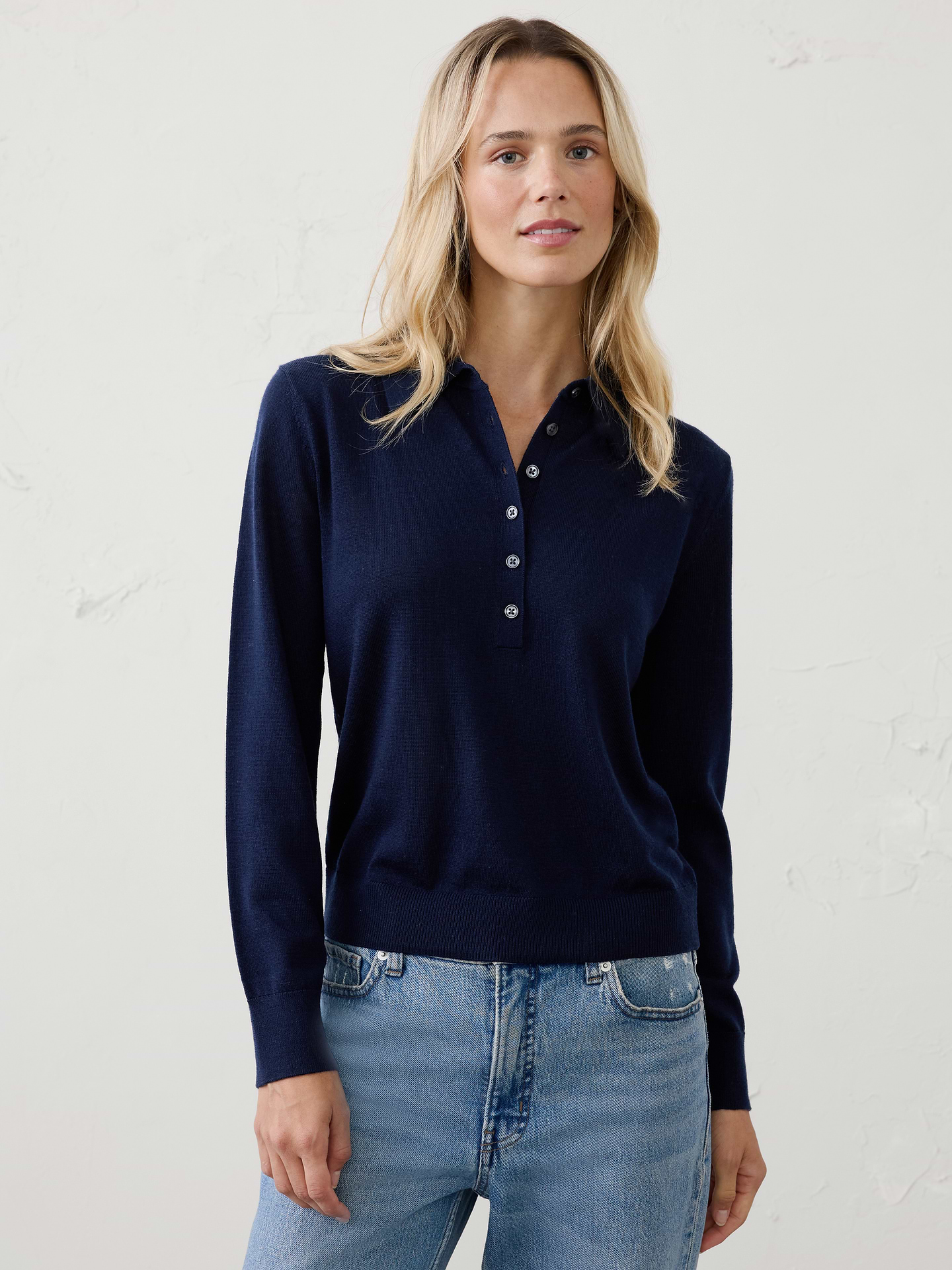 Image 1 of 1, Crafted from luxuriously soft Merino wool, this sweater offers lightweight warmth and natural breathability for all‑day comfort. Perfect for layering or wearing on its own, it delivers timeless versatility with an effortlessly refined finish., Polo collar. Long sleeves., Button placket., Ribbed arm cuffs and hem., Made exclusively for Banana Republic Factory., Product #1177059