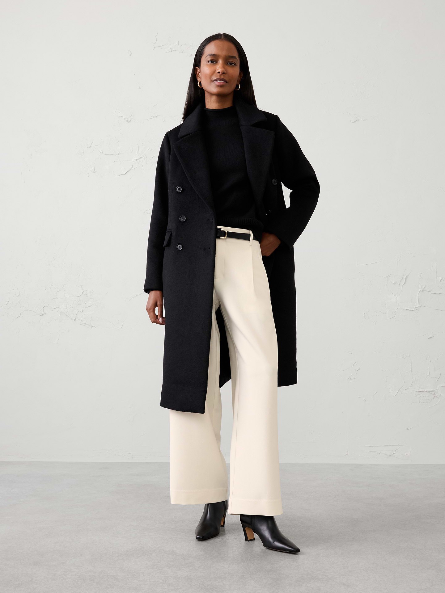 Image 1 of 3, This pant is crafted from our substantial heavy bistretch fabric for structure, comfort, and all‑day wearability. A subtle front pleat adds a tailored touch, creating a polished look that's perfect for the back half of the year. Versatile and refined, it pairs effortlessly with everything from sweaters and blouses to tailored jackets., SUSTAINABILITY: Made with 77% recycled polyester., Classic fit. Mid rise. Wide leg. Full length., Hook-and-bar closure with zip fly. Belt loops., Front pleat detailing., Vertical welt front pockets., Back welt pockets., Back waist darts., Made exclusively for Banana Republic Factory., Product #1182233