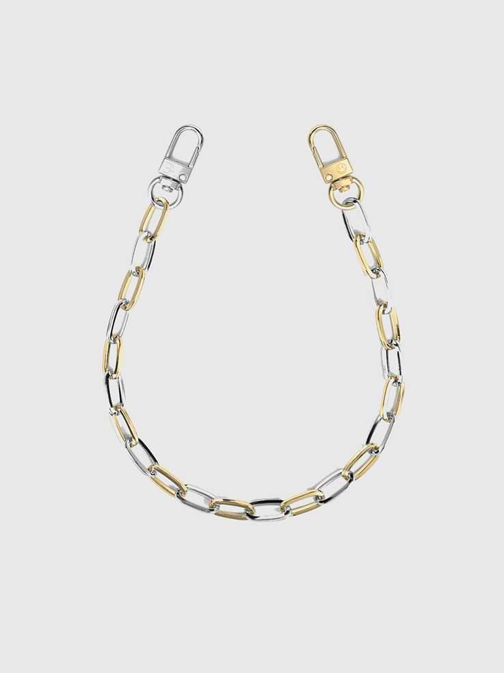 Image 1 of 1, Keep your phone protected and beautifully adorned with the Gold/Silver Paperclip Chain, a sleek mixed-metal wristlet that effortlessly enhances your everyday style., Universal Phone Hitch required to attach to your phone case, sold separately., THE CÆP in no way guarantees the integrity of your smartphone or screen when using this strap. Handle with care and employ your cell phone at your own risk.