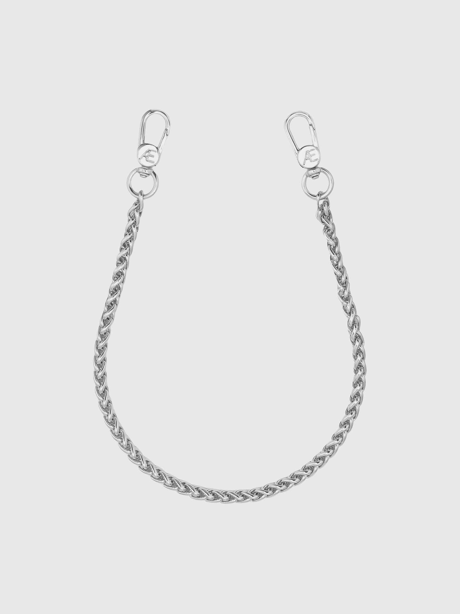 Image 1 of 1, Sleek, chic, and endlessly functional, the Silver Round Chain Wristlet keeps your phone protected and beautifully adorned in a classic silver finish., Universal Phone Hitch required to attach to your phone case, sold separately., THE CÆP in no way guarantees the integrity of your smartphone when using this strap.
