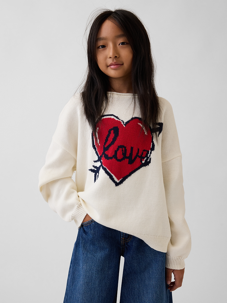 Image 1 of 5, Soft knit cotton sweater. In an oversized fit., Rollneck., Long sleeves with drop shoulders and banded cuffs., Ribbed hem., Assorted colors, graphics, and prints., Product #908921