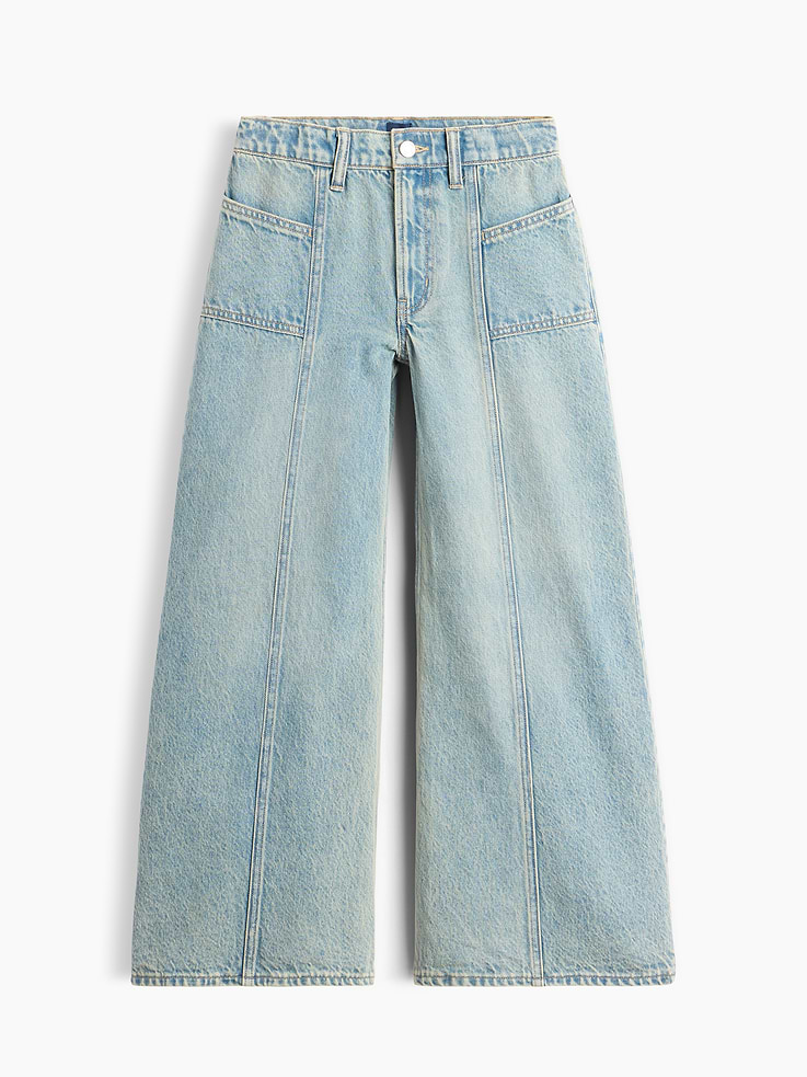 Image 1 of 4, Authentic, non-stretch denim wide-leg jeans., Button at center (sizes 4-8 have a hook & bar closure beneath faux snap for easy on and off), zip fly., Four-pocket styling., Seams at front., Light wash., Responsibly Made: This pair of jeans is part of our water-saving Washwell program. Compared with conventional wash methods, Washwell uses at least 20% less water., More Sustainable Cotton: Made with 5% recycled cotton. Compared to virgin materials, using recycled materials helps reduce resource use and waste., This product was made in a factory that invests in gender equity and women’s empowerment through RISE. Learn more at gapinc.com/equity ., Product #1185396