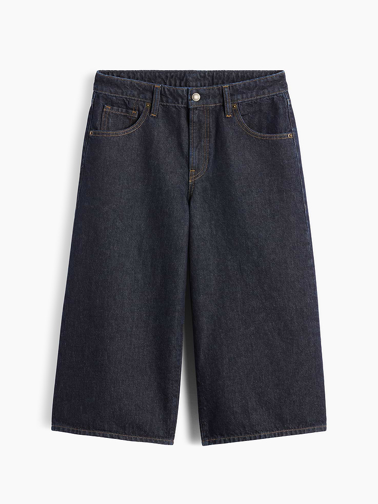 Image 1 of 2, Fit: A barrel culotte jean that's fitted at the waist with a relaxed leg. In a cropped length that hits just below the knee., Fabric: 100% Cotton., Stretch: No Stretch Jeans. Authentic denim that gets better with every wear. Made to wear all day & break in over time., Look: A classic five-pocket barrel-leg culotte jean in a dark wash., Details: Zip fly & five-pocket styling, Responsibly Made: This pair of jeans is part of our water-saving Washwell program. Compared with conventional wash methods, Washwell uses at least 20% less water., More Sustainable Cotton: Made with 5% recycled cotton. Compared to virgin materials, using recycled materials helps reduce resource use and waste., Explore our GapJeans Guide ., Product #1194450