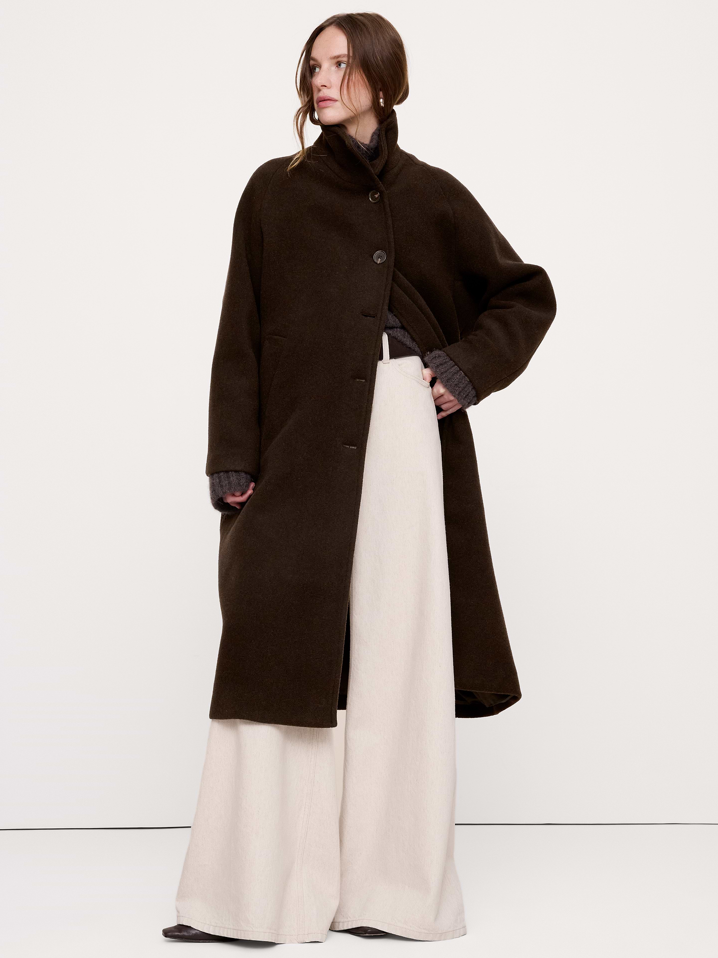 Image 1 of 7, A classic topcoat silhouette, crafted here in a heavier wool-blend from Italy's Manifattura Emmetex that we love for its felted texture and softness. Plus, we kept the fit relaxed to you can layer it over your heaviest sweaters through the cooler months., Ultra oversized fit: Extra room through chest, shoulders, and waist. Dropped shoulder seams., Fabric from Italy's Manifattura Emmetex., Stand collar with button front., Front pockets., Fully lined., Product #1180466
