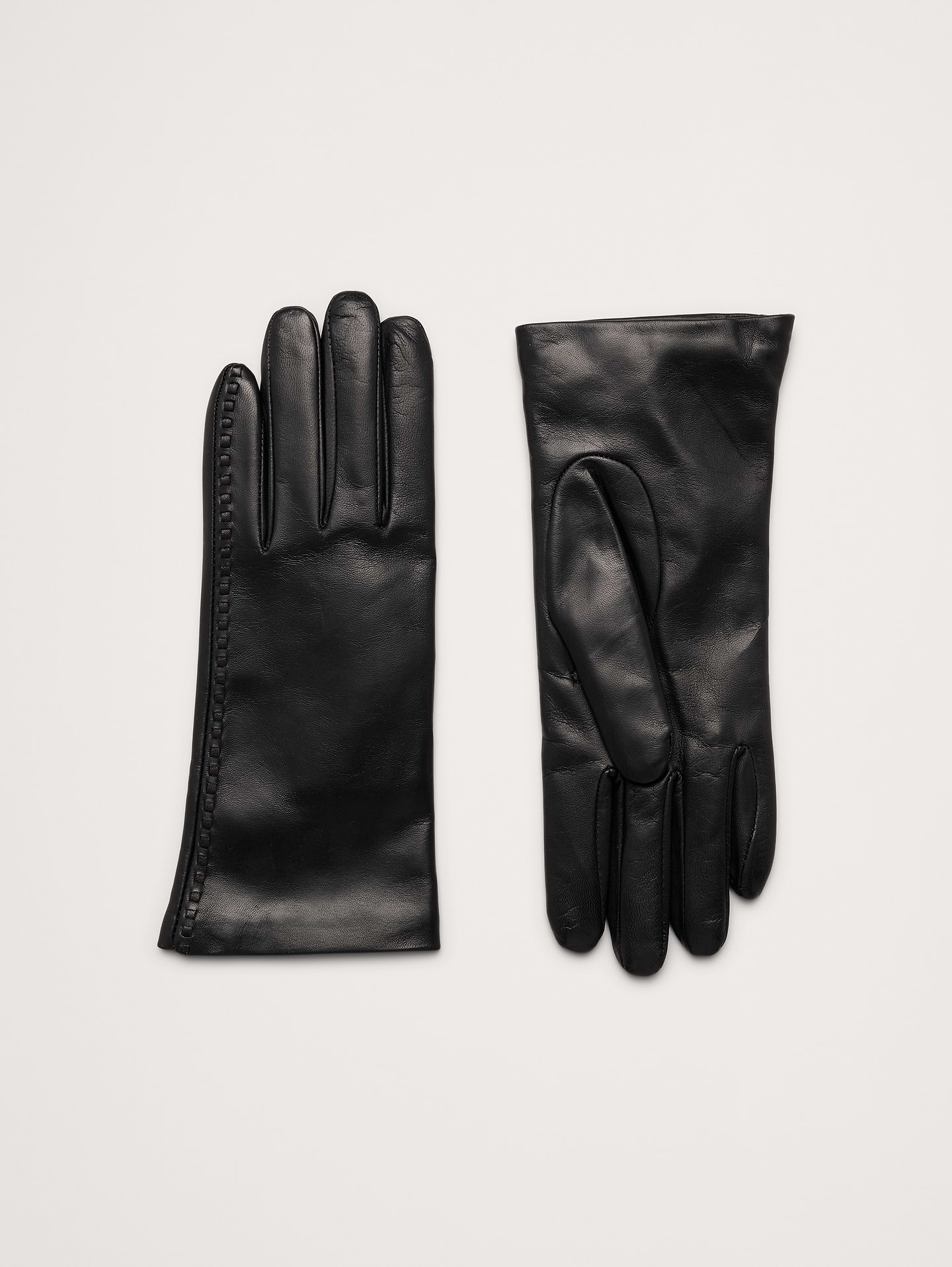 Image 1 of 3, These cashmere-lined gloves showcase their beautiful leather quality free from ornament—the better to highlight their masterful Italian craftsmanship., Cashmere lining., Made in Italy., Product #909472