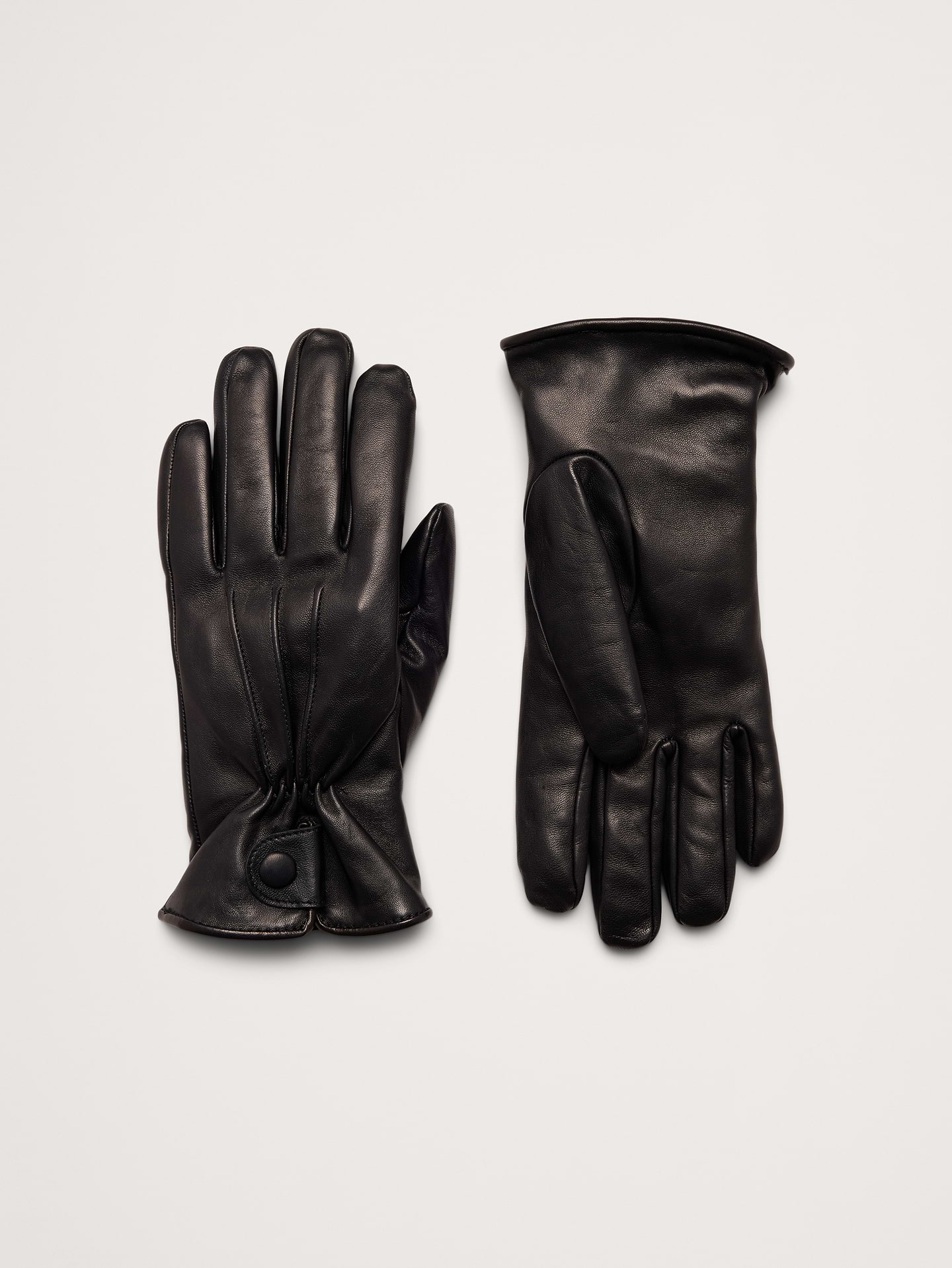Image 1 of 2, You wont find another pair quite like this. Crafted in Italy from beautiful leather, we added beautiful pintuck detailing to the wrists and lined these timeless dress gloves with soft cashmere for added luxury., Fabric from Italy's Gianni Collini Srl., Product #906936