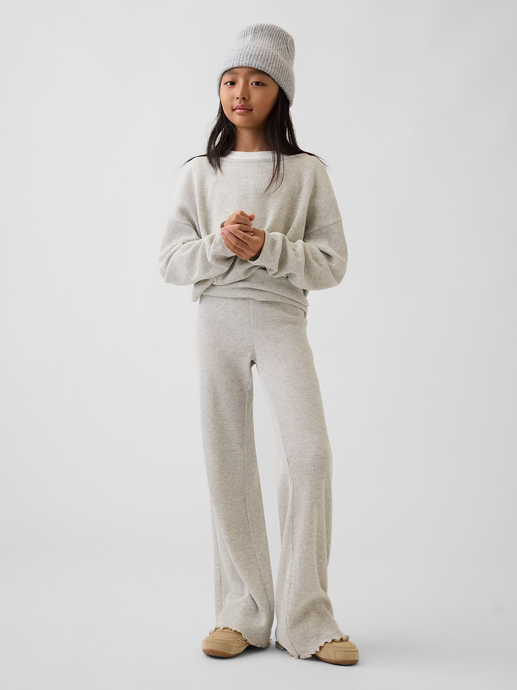 Image 1 de 5, Tricot gaufré doux., Taille élastique rabattable., Ourlet ondulé., Ce produit a été fabriqué dans une usine qui investit dans l’égalité des genres et l’autonomisation des femmes grâce au programme Reimagining Industry to Support Equality (RISE). En savoir plus: Combler les lacunes en matière d’équité | Gap Inc. ., Produit #1184756