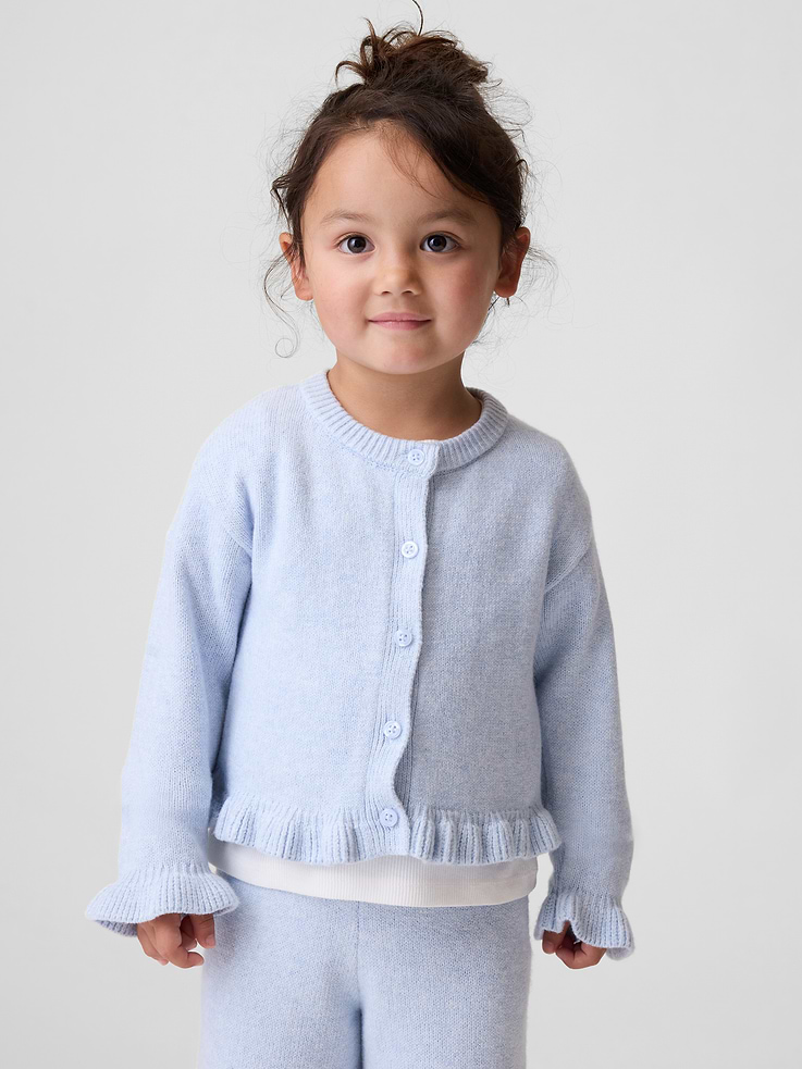 Image 1 of 4, Our bestselling fabric that feels cashmere-soft. Crafted in a midweight plush yarn. Refined with a special brushed technique. It's everyday luxury., Soft knit cotton-blend button-up cardigan sweater., Crewneck, button front., Long sleeves with drop shoulders., Ribbed ruffle cuffs and hem., Product #1182543