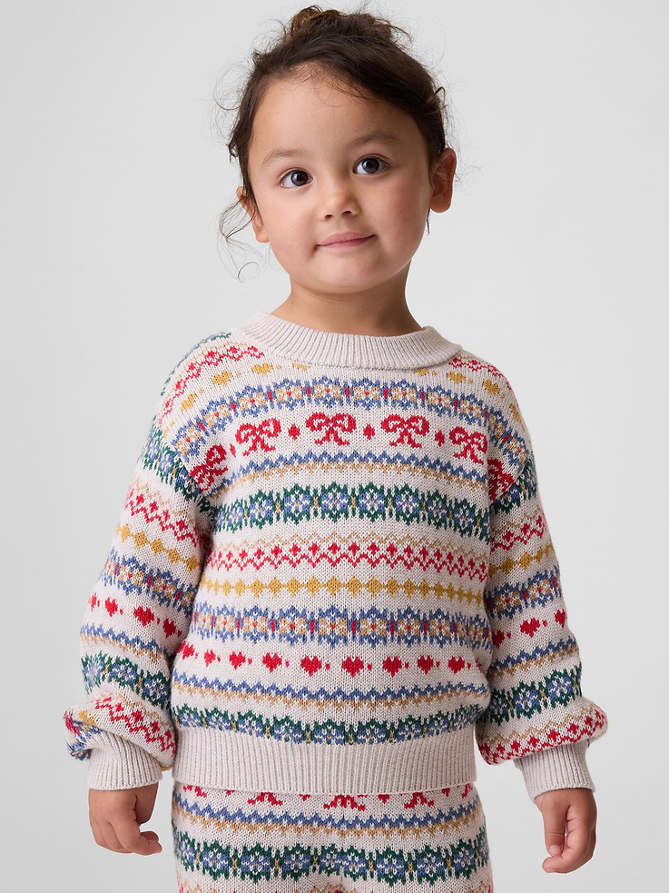 Image 1 of 4, Soft knit cotton sweater., Crewneck., Long sleeves., Ribbed cuffs and hem., Graphic at front or allover print., This product was made in a factory that invests in gender equity and women’s empowerment through RISE. Learn more at gapinc.com/equity ., Product #1184977